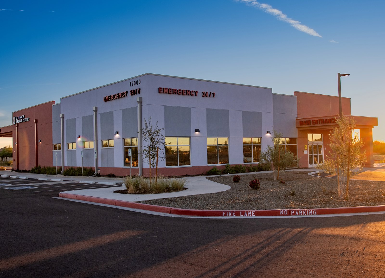 El Mirage ER at dusk — EMERGENCY 24/7 lit on the parapet.